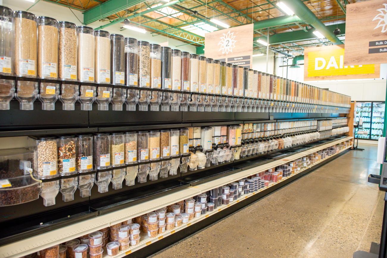 A row of bulk bins at Community Natural Foods newly renovated store in Calgary