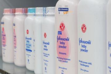 A store shelf lined with Johnson & Johnson talc products